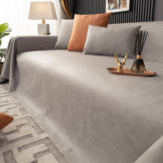 Couvre-canapé matelassé protecteur élégant